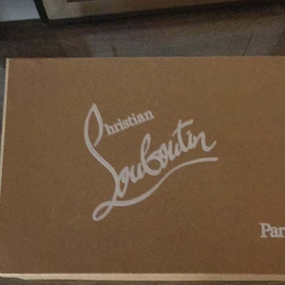 White Christian Louboutin shoes for sale!